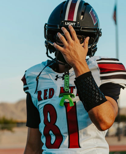 High School football receiver athlete wearing the medium size wrist coach in a game