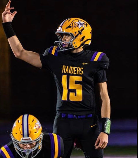 high school quarterback wearing the black playbook wrist coach
