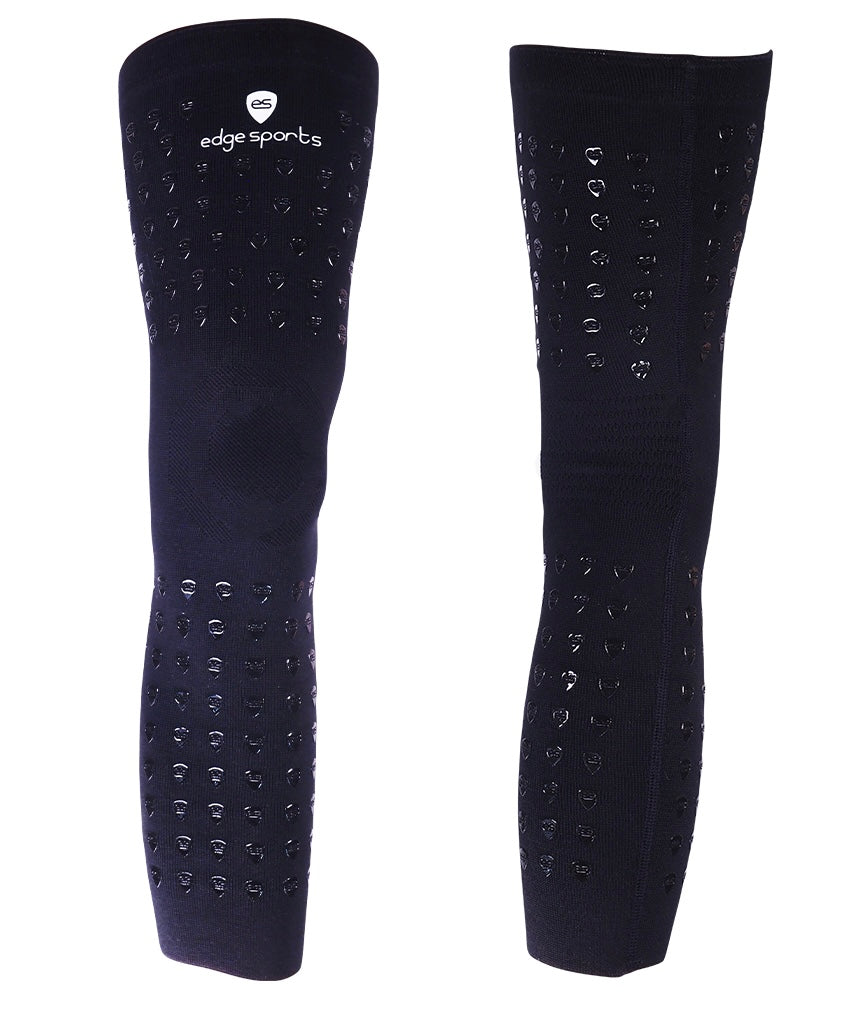 pair of black anti-migration knee sleeves for athletes to keep braces from slipping during sports