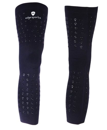 pair of black anti-migration knee sleeves for athletes to keep braces from slipping during sports